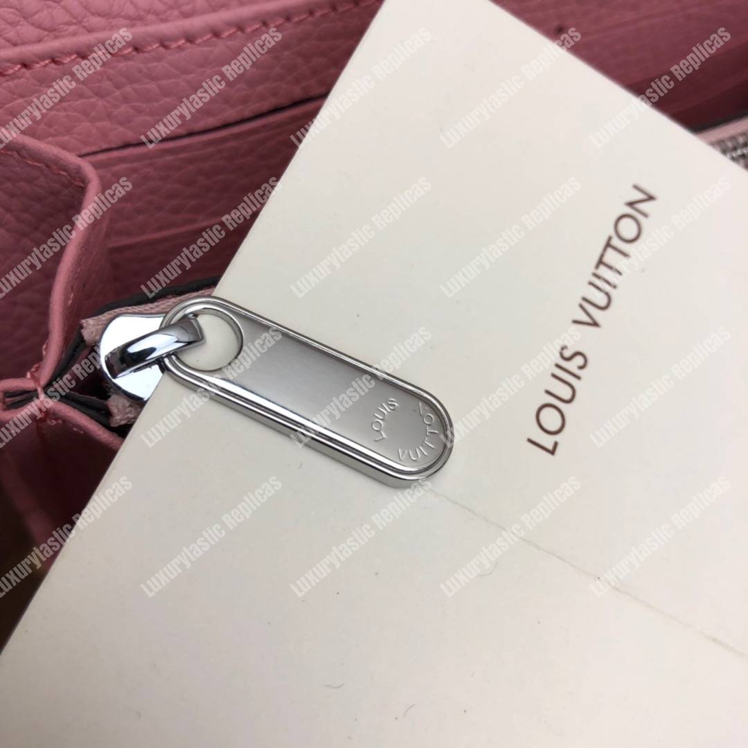 LV Iris Wallet Mahina Leather Magnolia