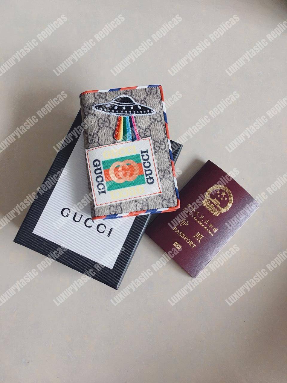 G*u*i courrier gg sup*e passport case beige ebony
