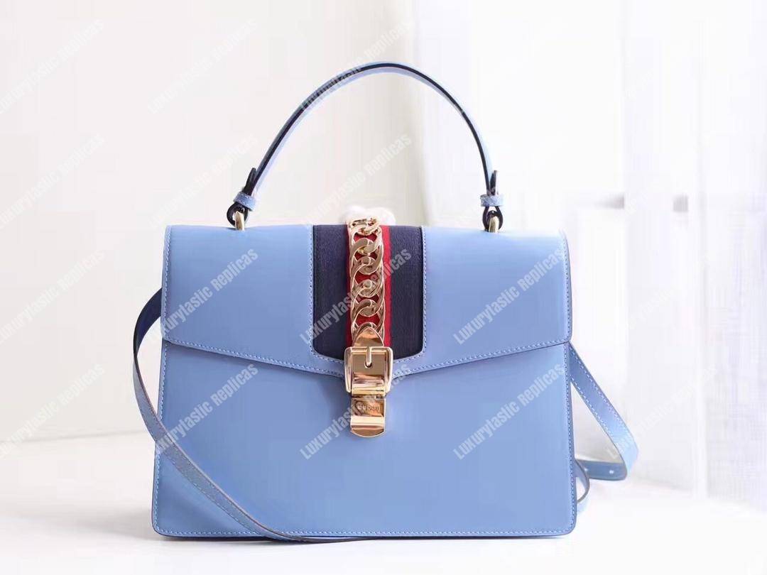G*u*i sylvie medium top handle bag light blue leather