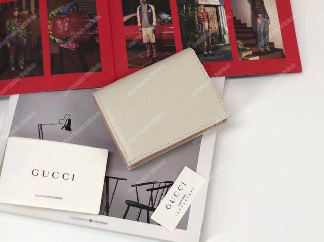 G*u*i leather zip wallet with bow white