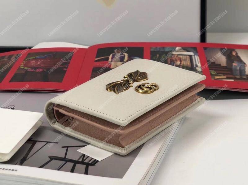 G*u*i leather zip wallet with bow white