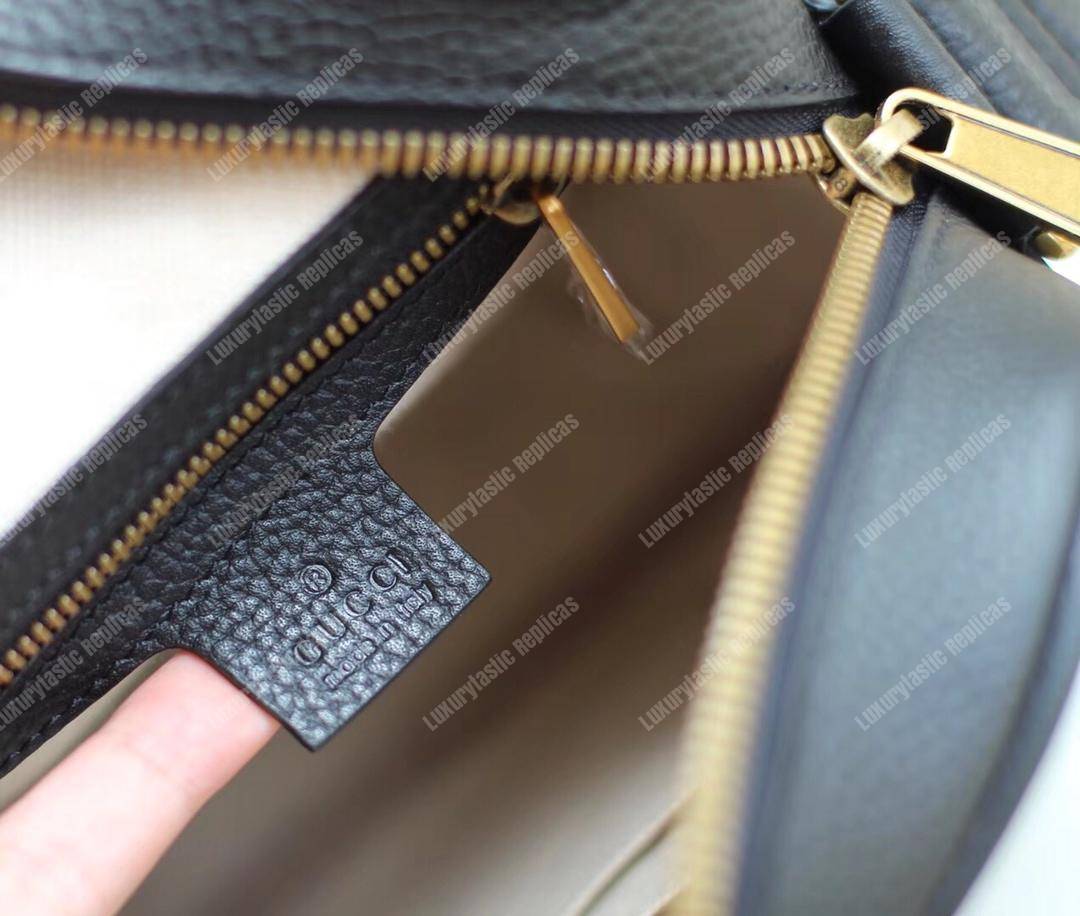 G*u*i print messenger bag black leather