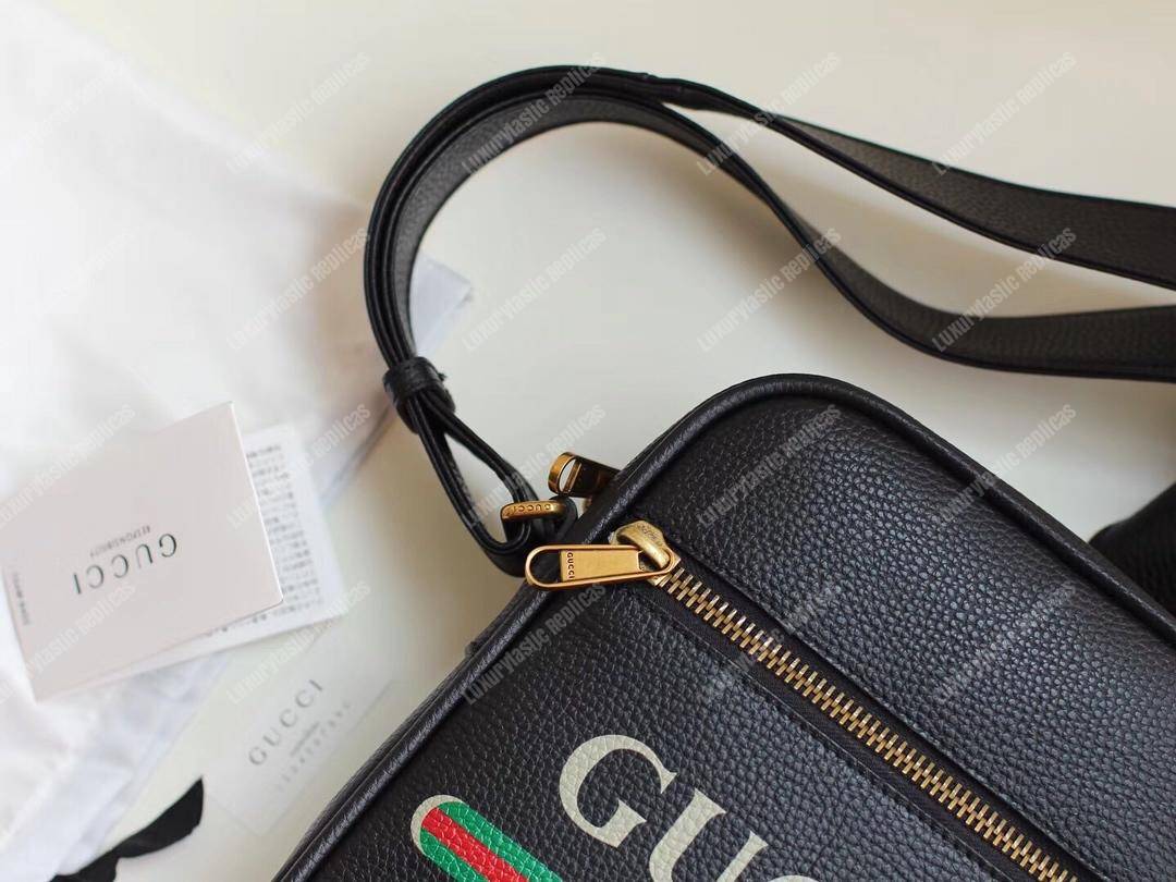G*u*i print messenger bag black leather