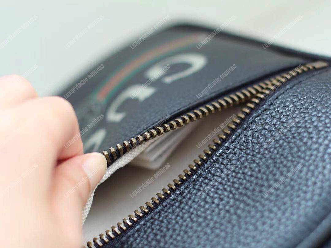 G*u*i print messenger bag black leather