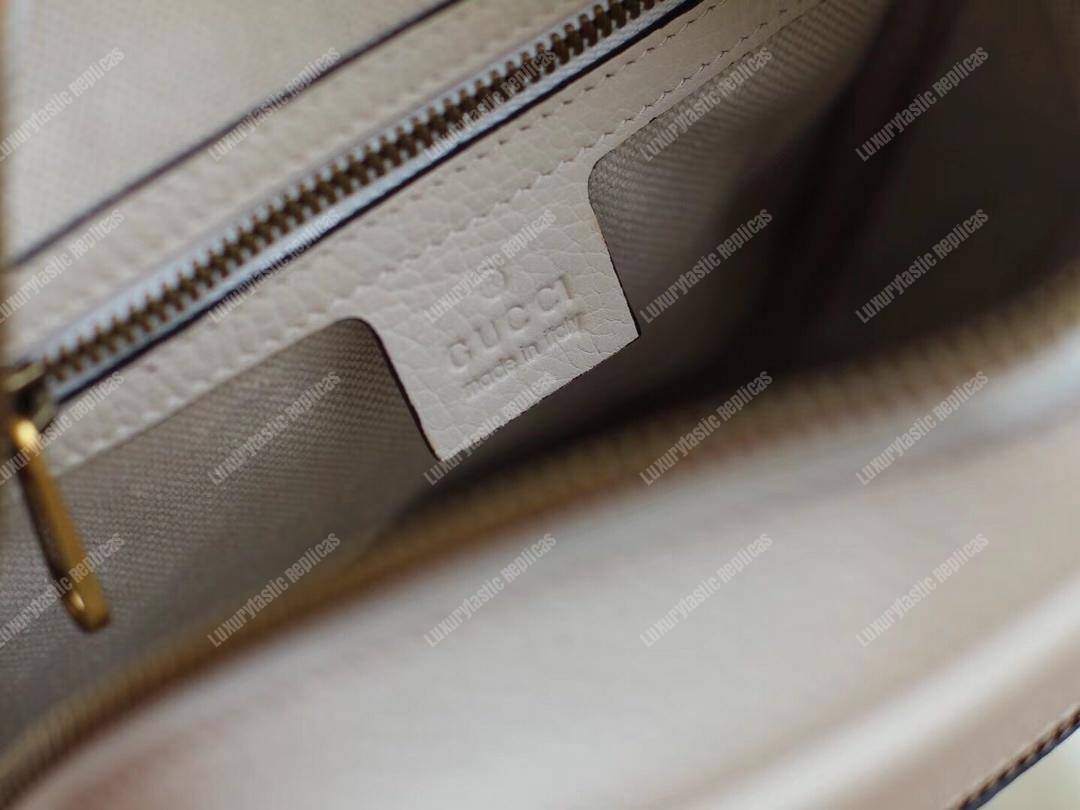 G*u*i print messenger bag white leather