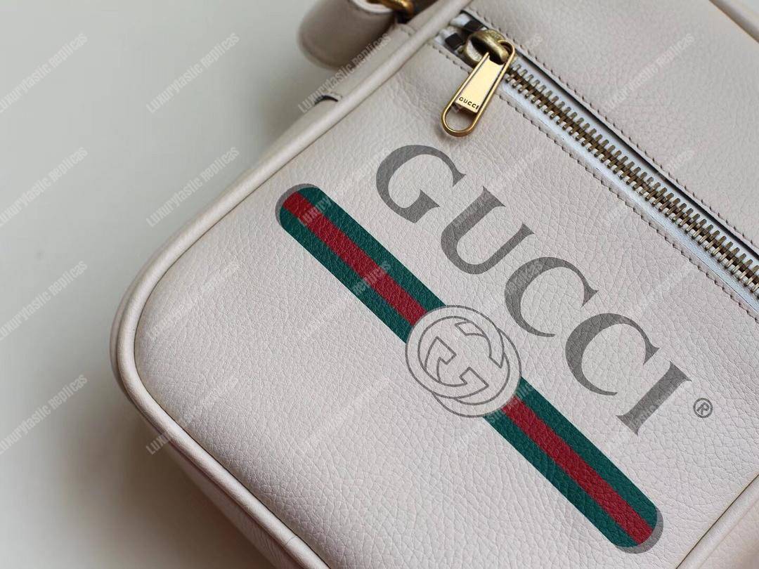 G*u*i print messenger bag white leather