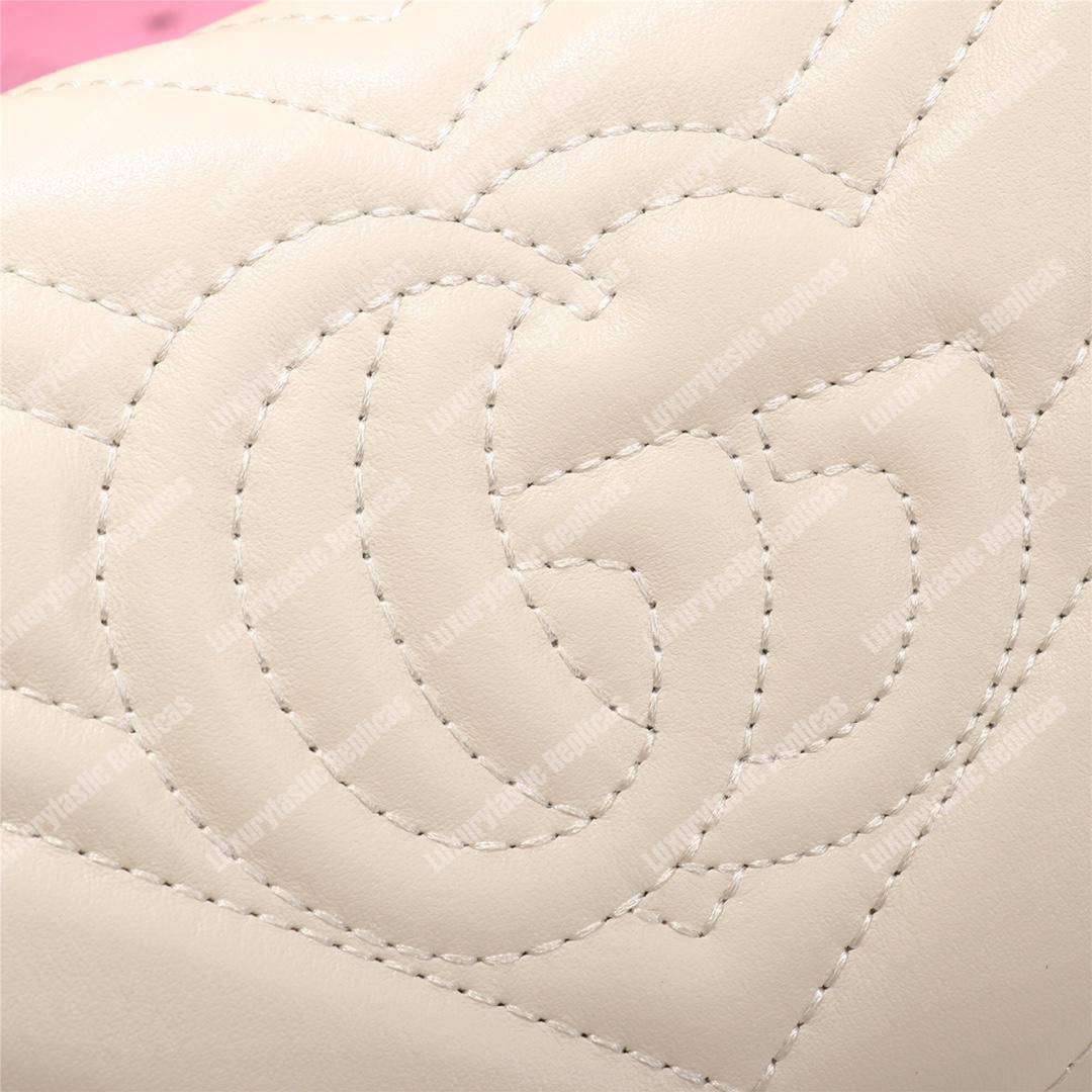 G*u*i gg marmont continental wallet with animal studs white