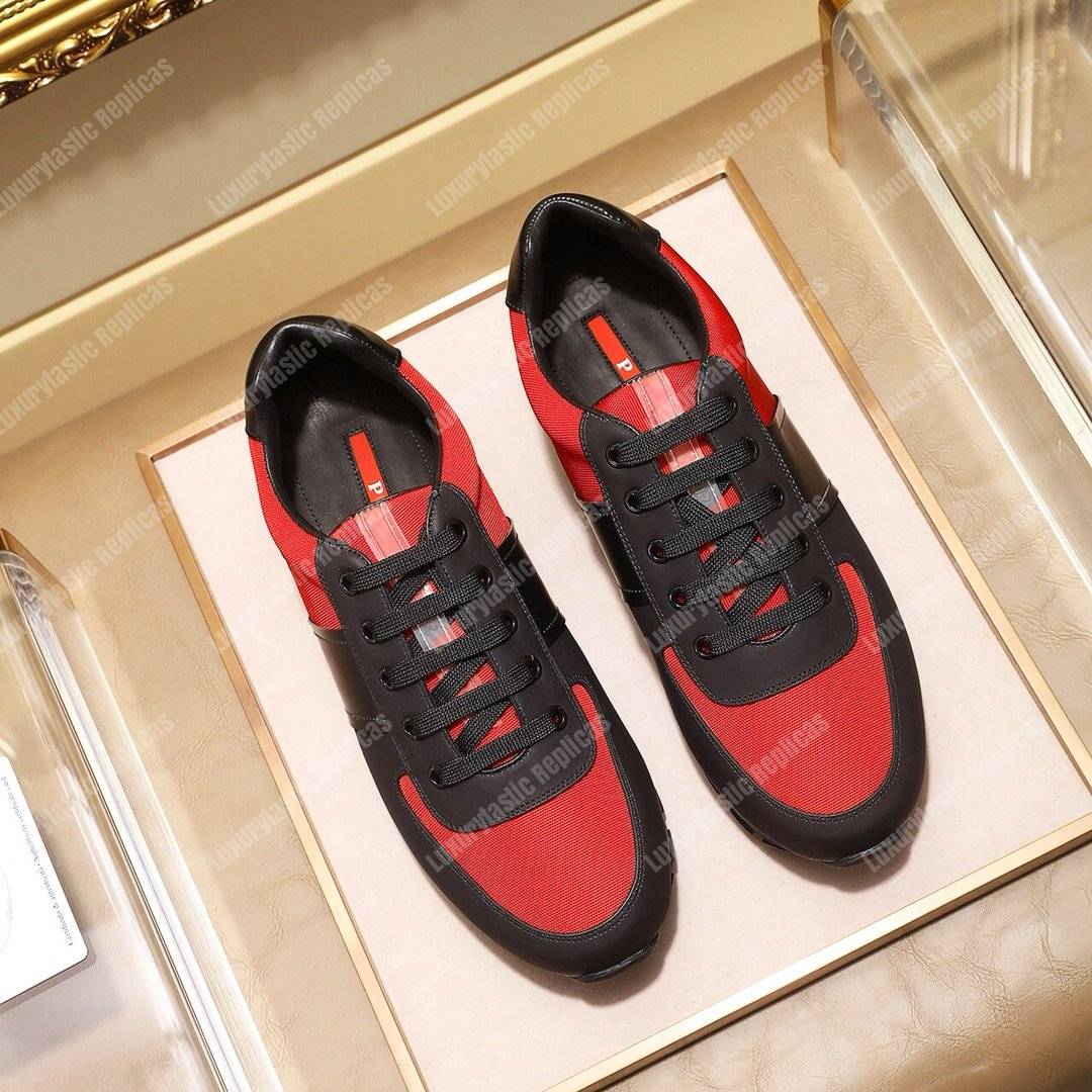 Pra*a fabric and leather sneakers red/black