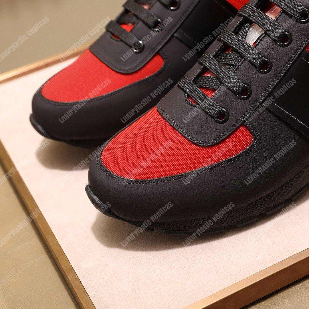 Pra*a fabric and leather sneakers red/black
