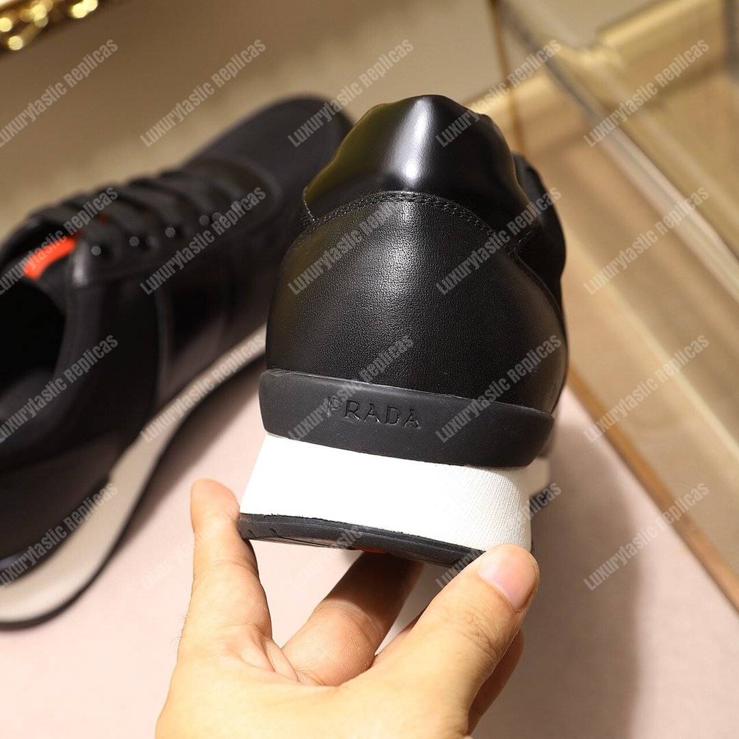 Pra*a fabric and leather sneakers black
