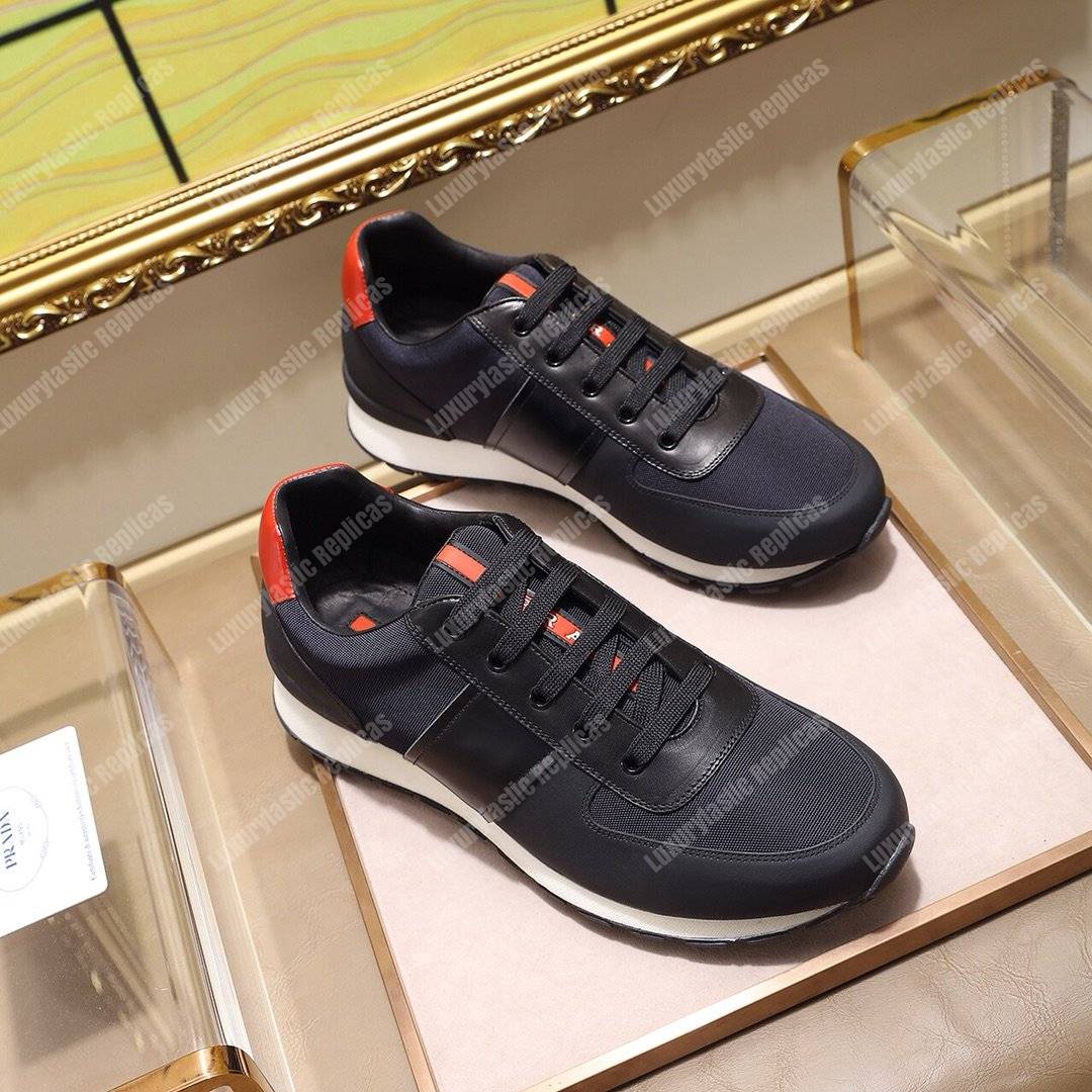 Pra*a fabric and leather sneakers blue/black/orange