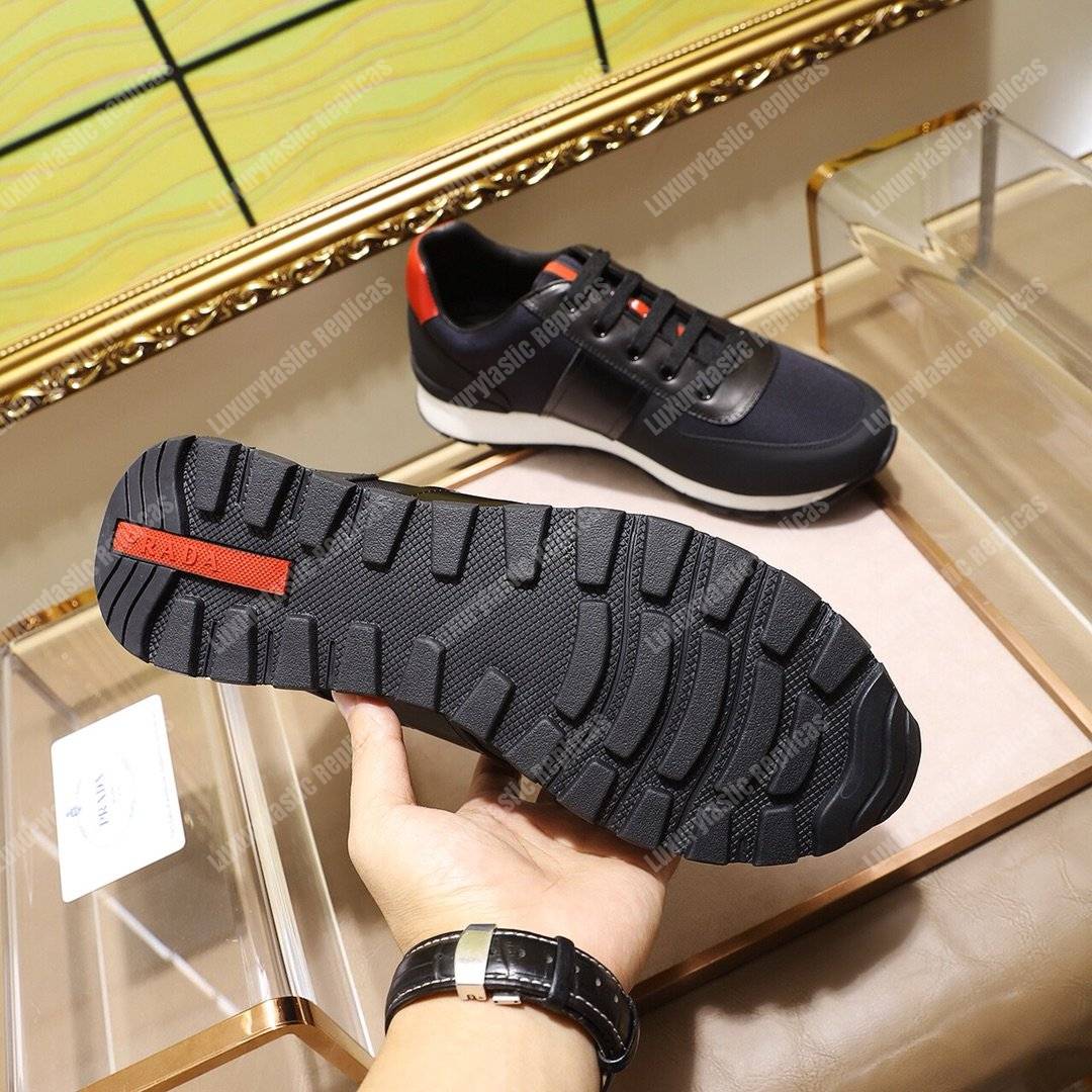 Pra*a fabric and leather sneakers blue/black/orange