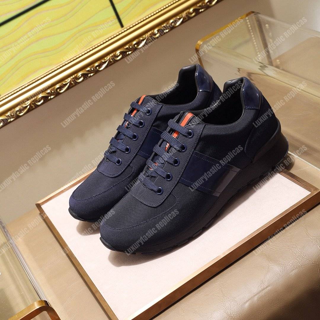 Pra*a fabric and leather sneakers dark blue