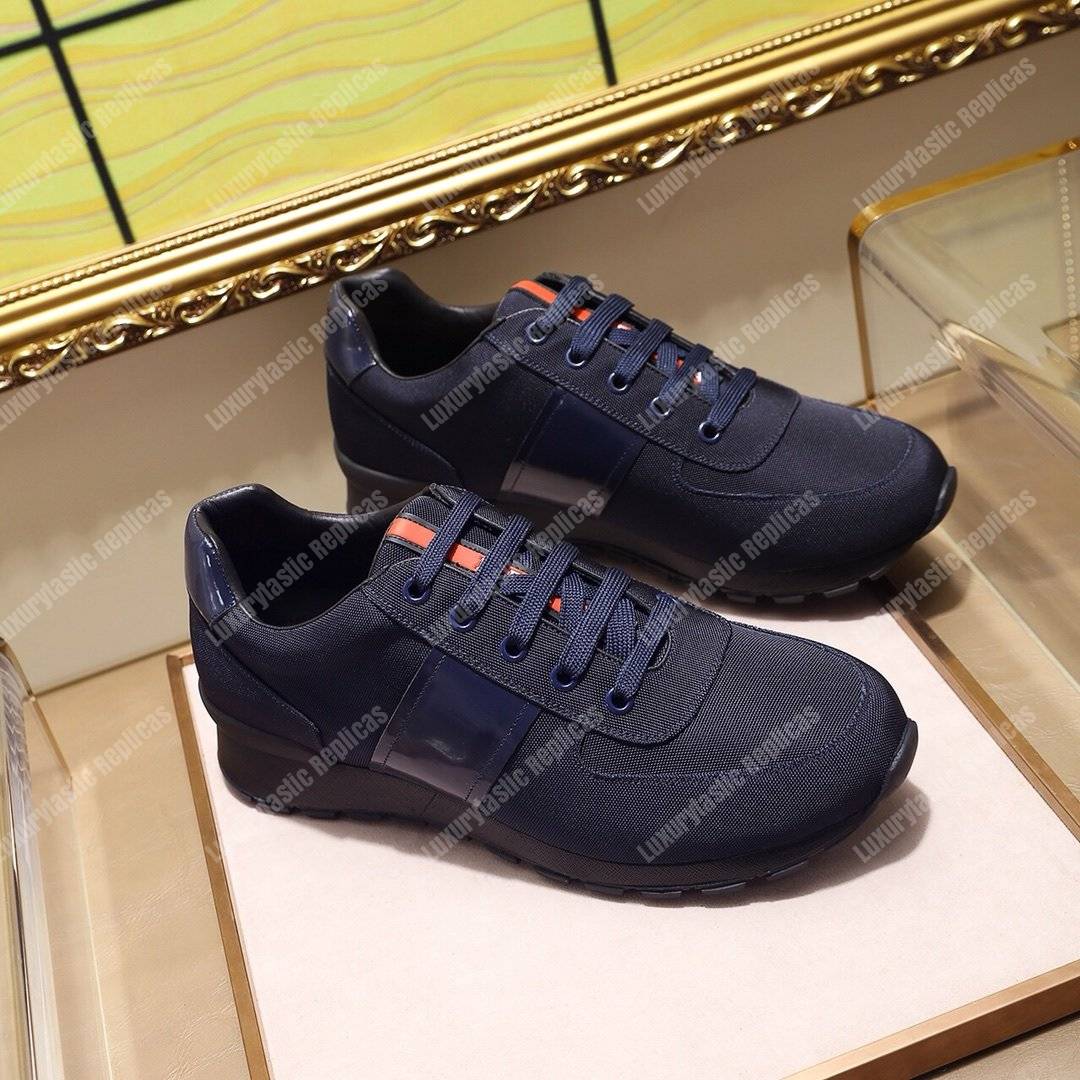 Pra*a fabric and leather sneakers dark blue