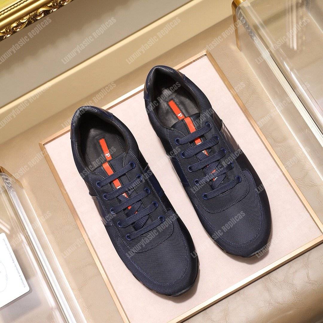 Pra*a fabric and leather sneakers dark blue