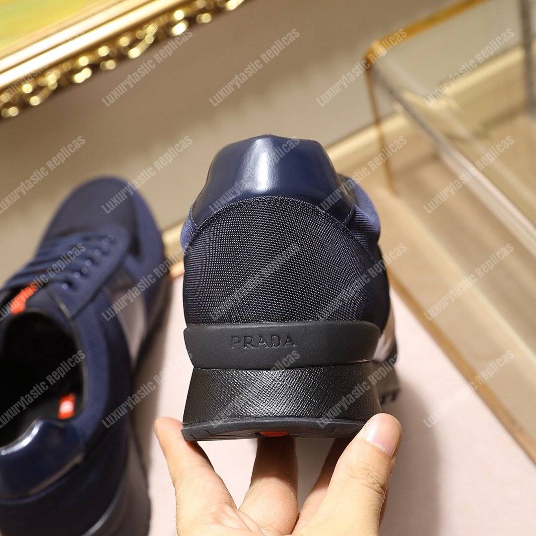 Pra*a fabric and leather sneakers dark blue