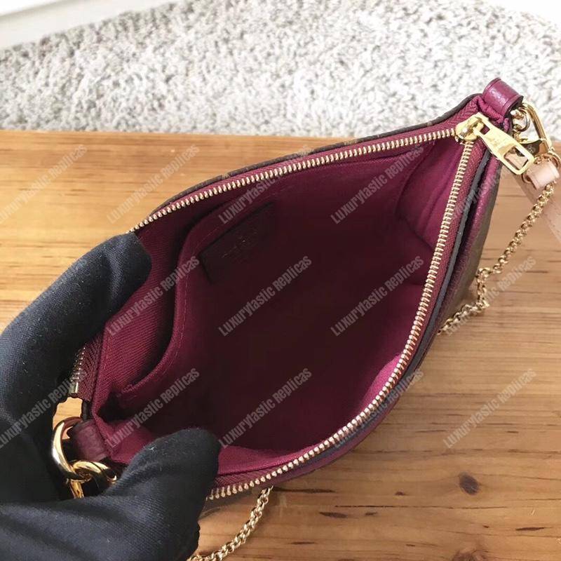 LV Pallas Clutch Bag Monogram Raisin