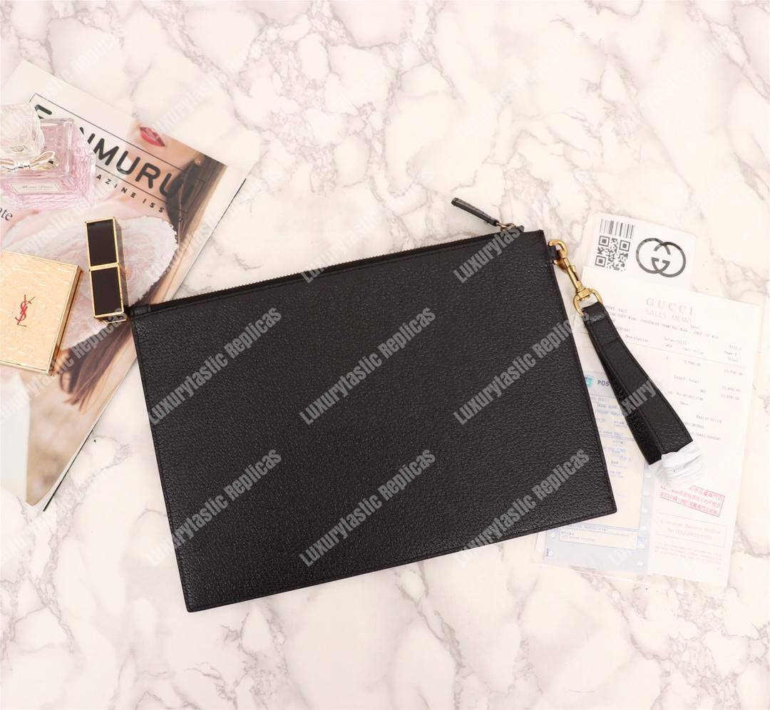 G*u*i animalier leather pouch tiger