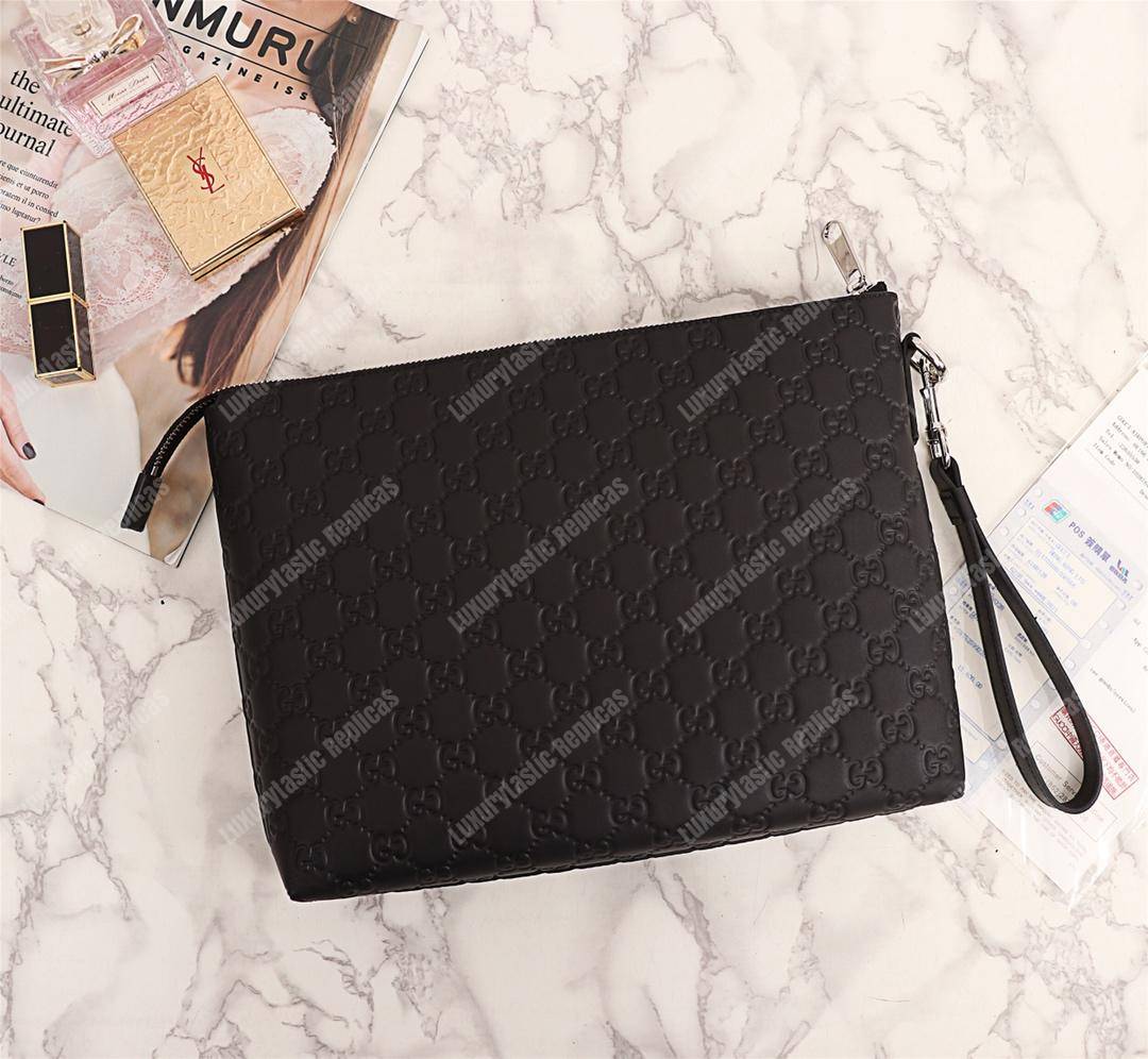 G*u*i signature leather men’s bag