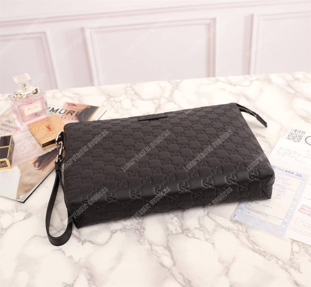 G*u*i signature leather men’s bag