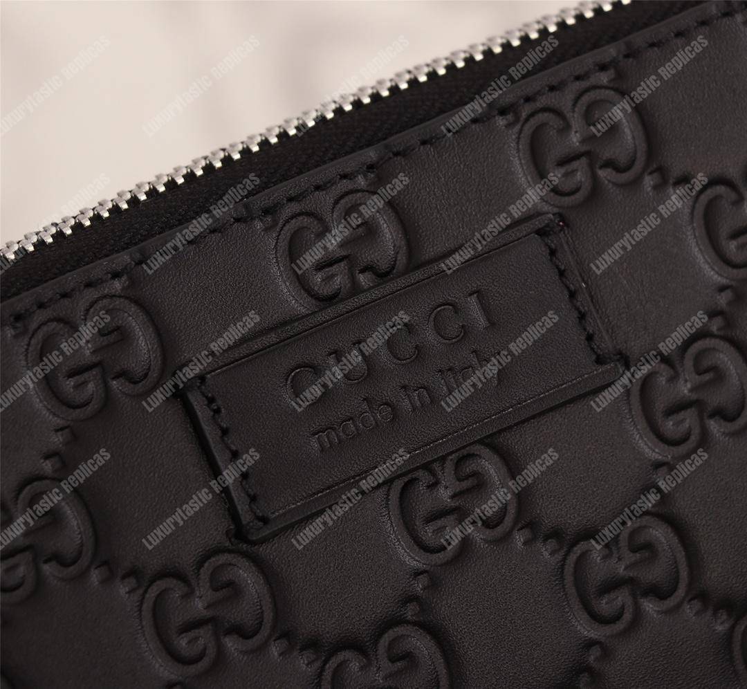 G*u*i signature leather men’s bag