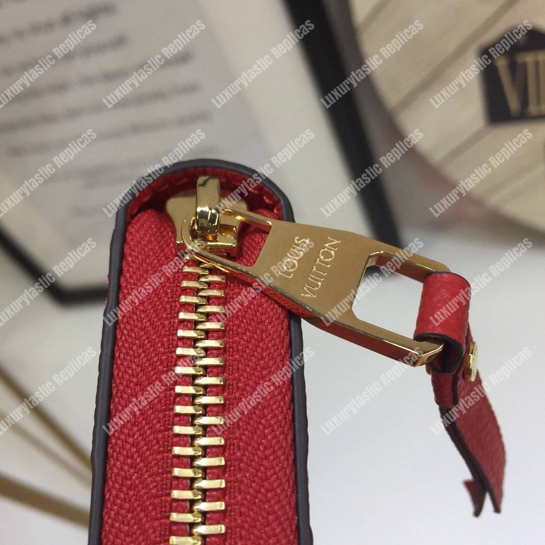 LV Clemence Wallet Monogram Empreinte Leather Cerise