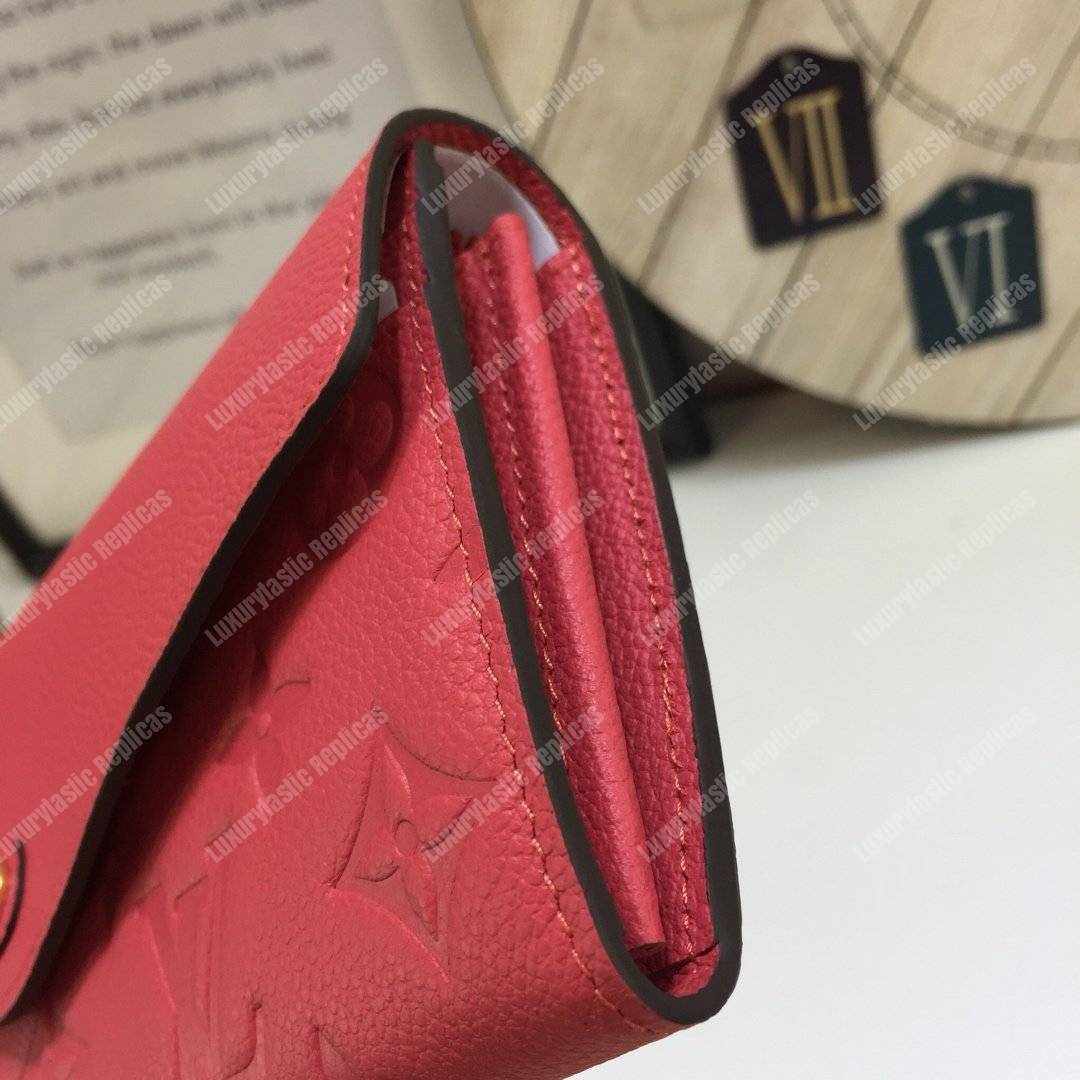 LV Sarah Wallet Monogram Empreinte Leather Scarlet