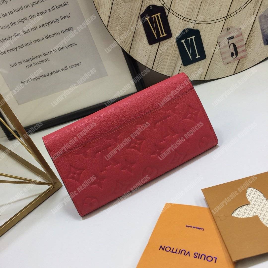 LV Sarah Wallet Monogram Empreinte Leather Scarlet
