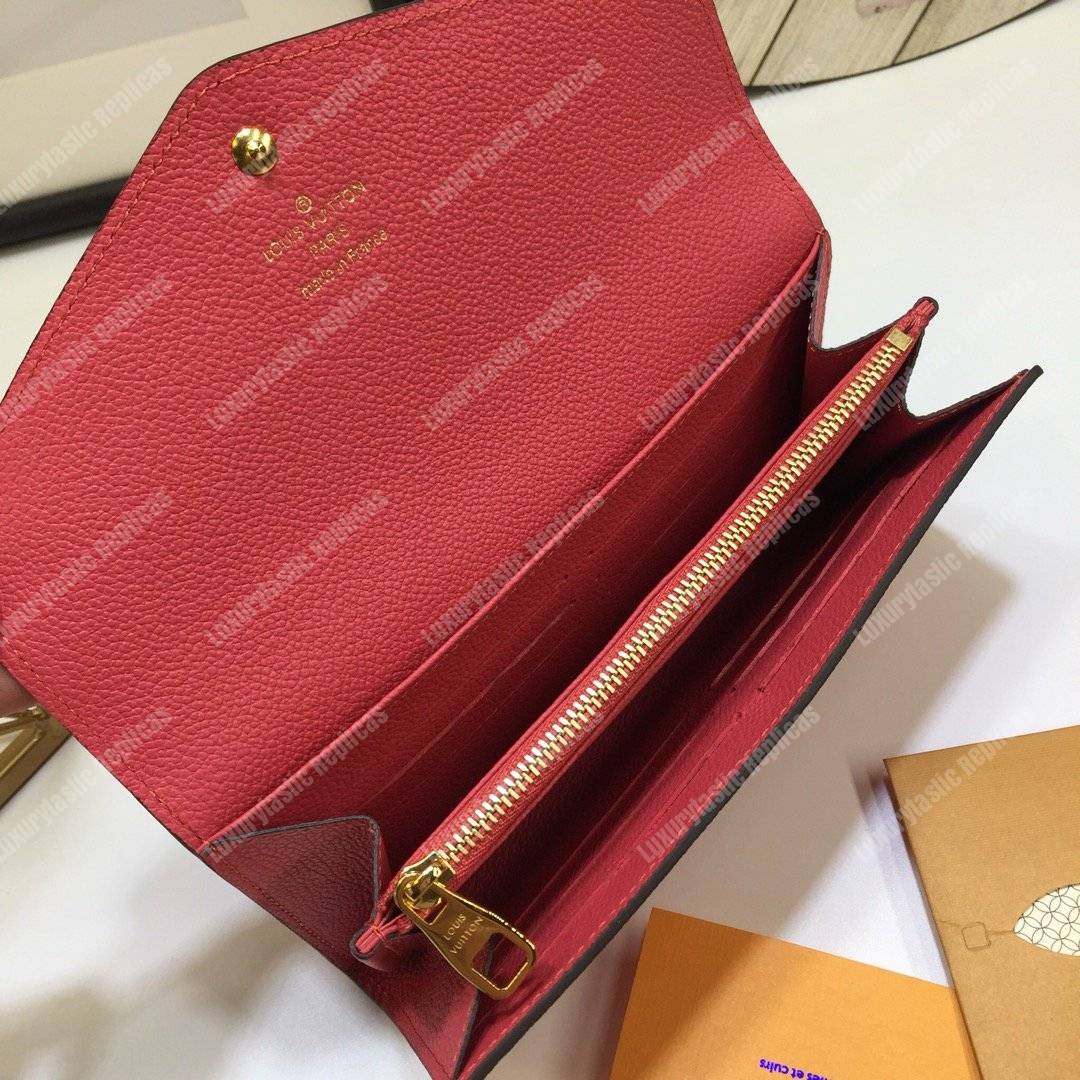 LV Sarah Wallet Monogram Empreinte Leather Scarlet