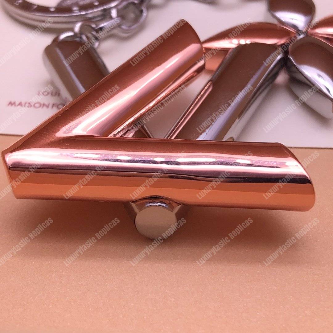 LV Twist Bag Charm Monogram Flower Silver Pink