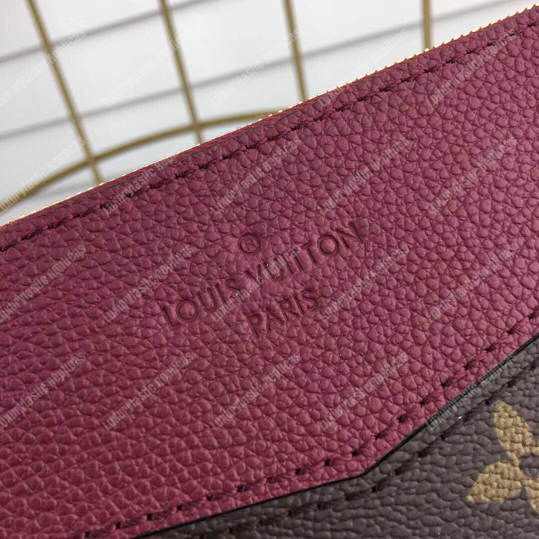 LV Daily Pouch Monogram Raisin