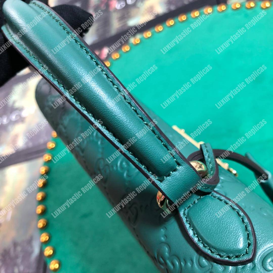 G*u*i padlock small signature top handle bag emerald green