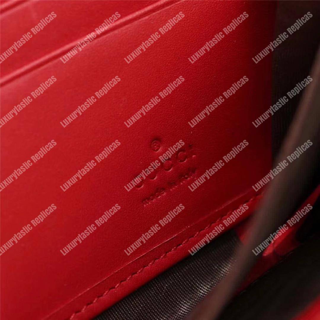 G*u*i icon G*u*i signature zip around wallet hibiscus red