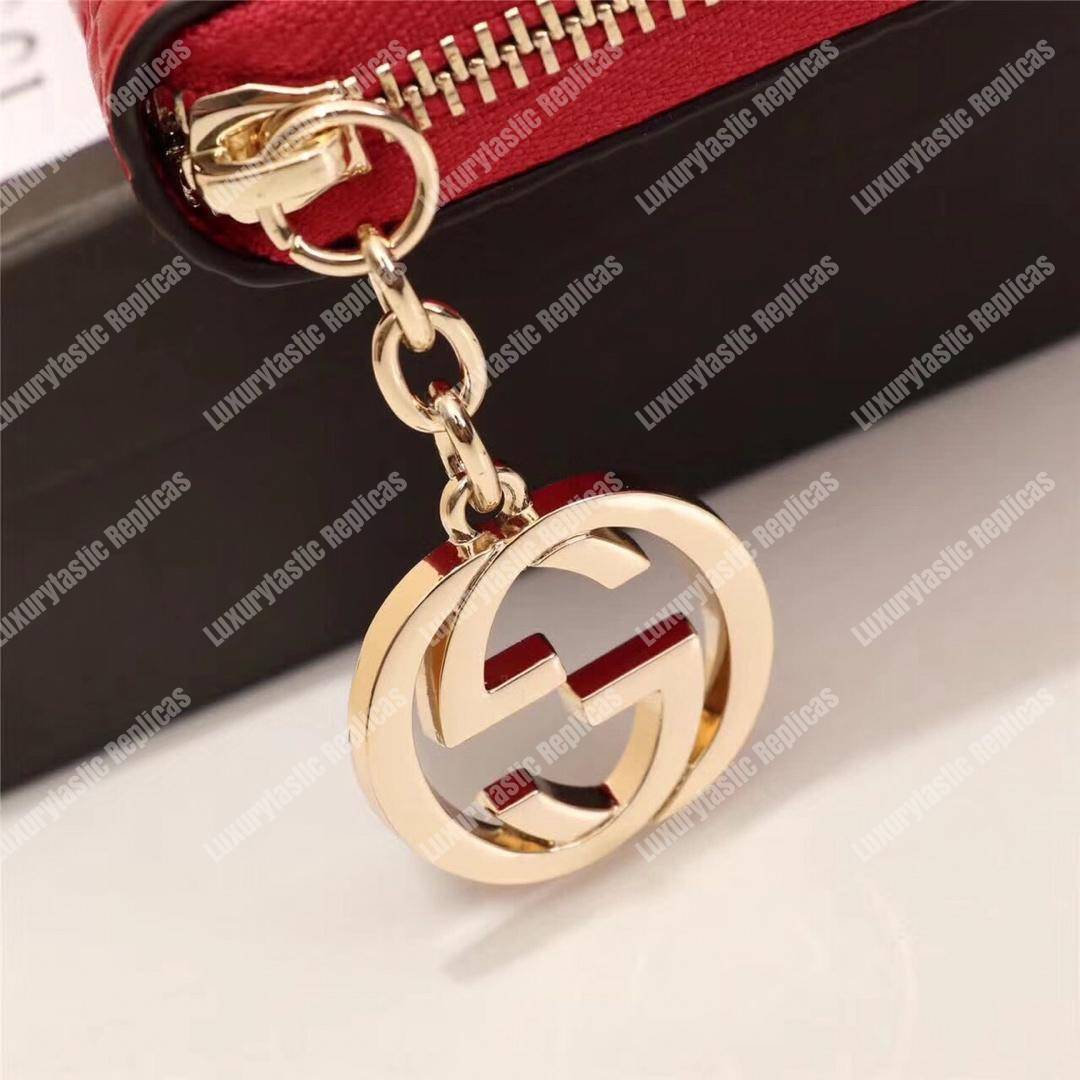 G*u*i icon G*u*i signature zip around wallet hibiscus red