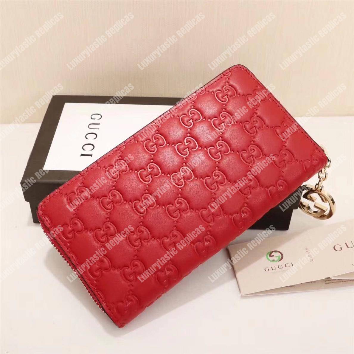 G*u*i icon G*u*i signature zip around wallet hibiscus red