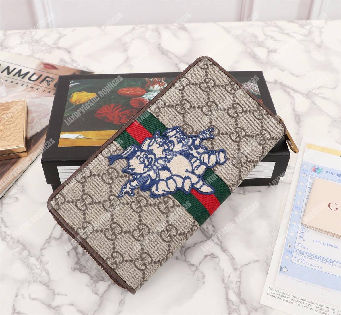 G*u*i gg zip around wallet with three little pigs