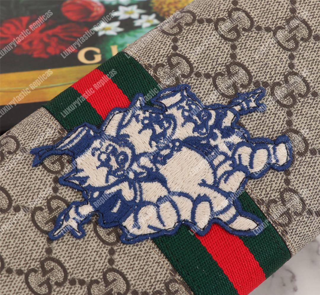 G*u*i gg continental wallet with three little pigs