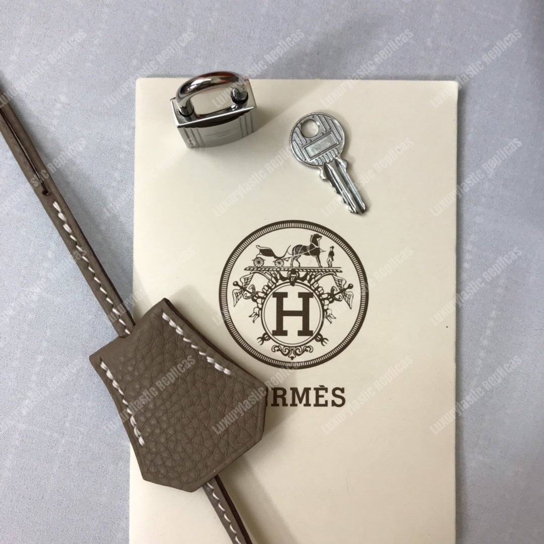 H**mes kelly 32 togo etoupe gold-toned hardware