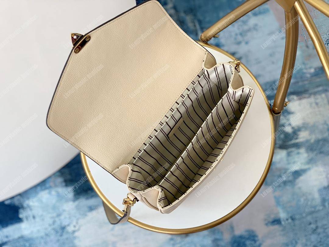 LV Pochette Metis Monogram Empreinte Leather Creme
