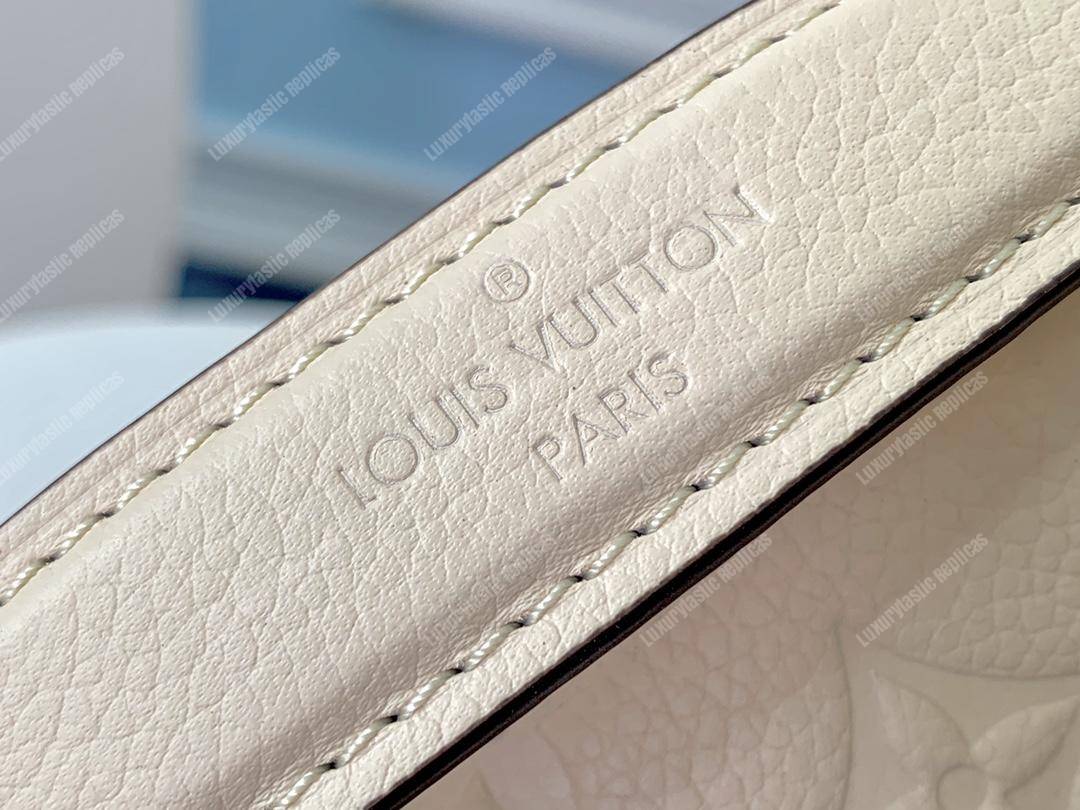LV Pochette Metis Monogram Empreinte Leather Creme