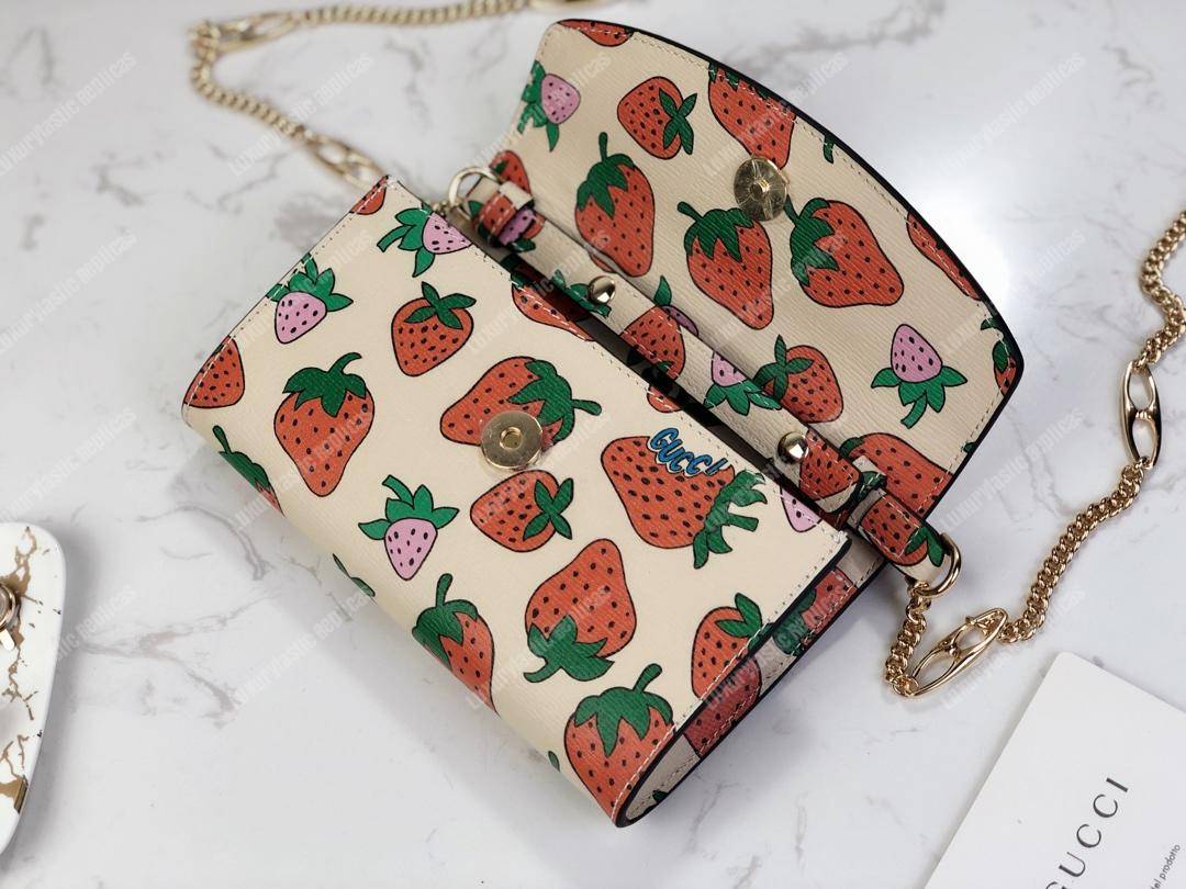 G*u*i zumi strawberry print mini bag