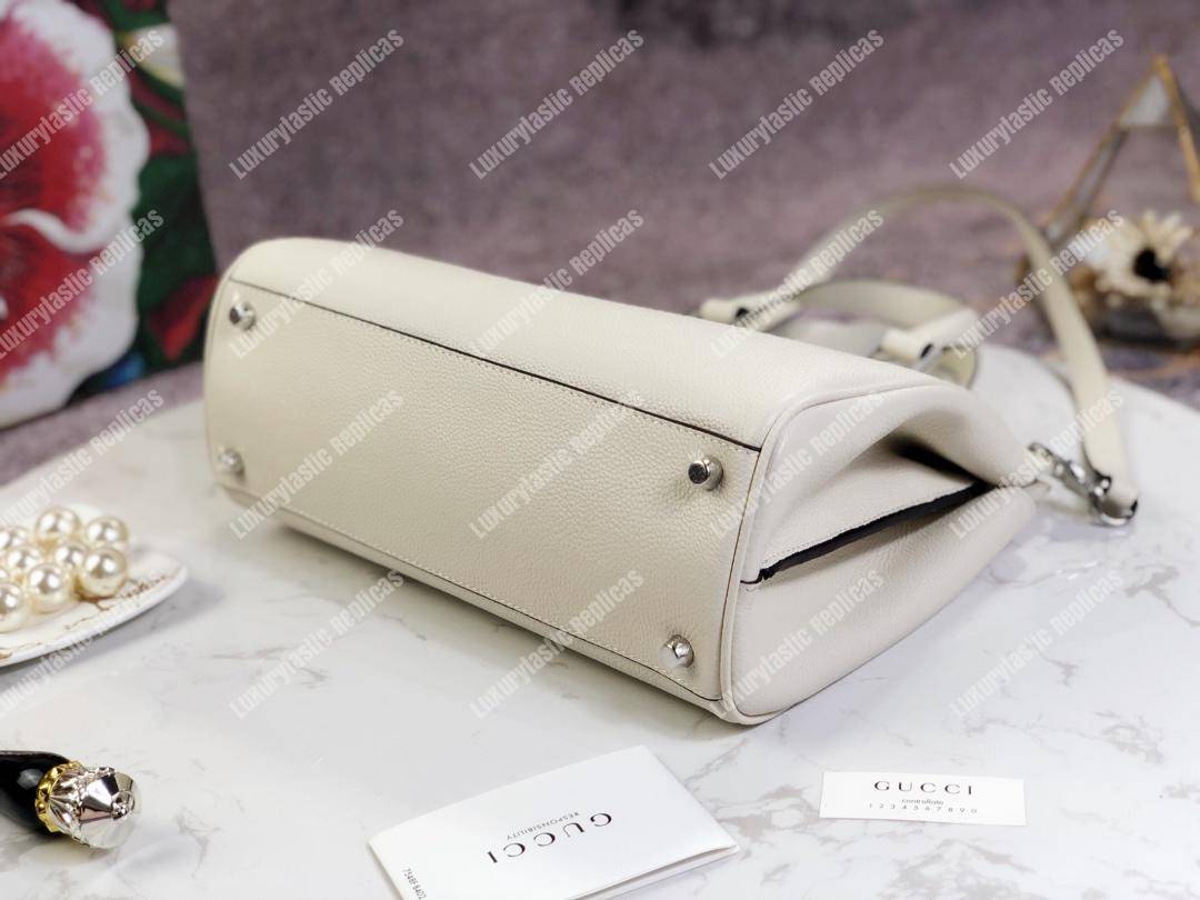 G*u*i zumi grainy leather small top handle bag white