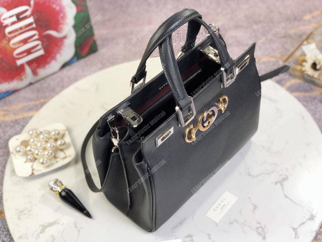 G*u*i zumi grainy leather small top handle bag black