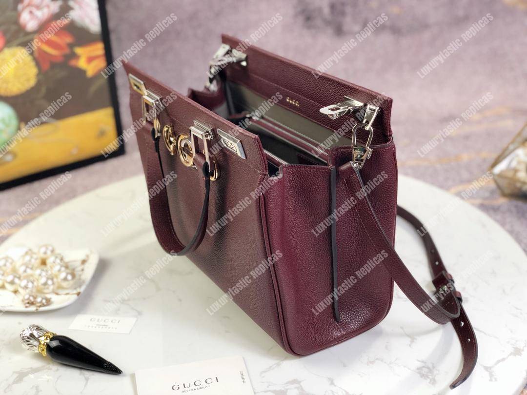 G*u*i zumi grainy leather small top handle bag burgundy
