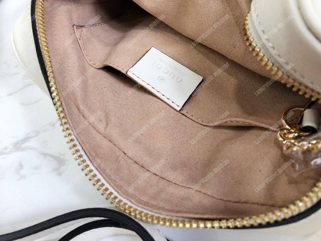 G*u*i ophidia leather mini bag white