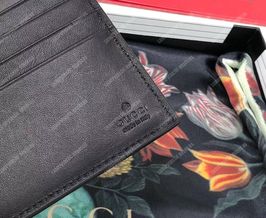 G*u*i gg wallet with tiger print