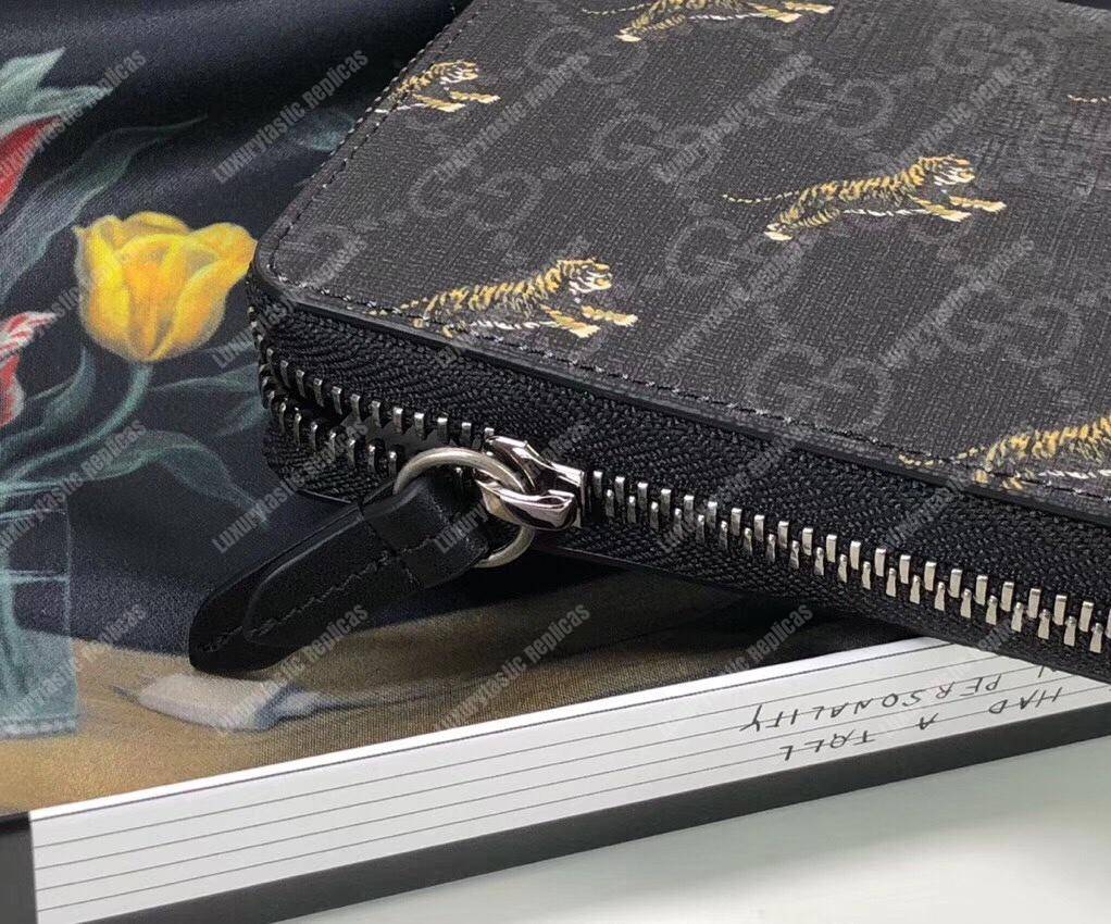 G*u*i gg zipped wallet with tiger print