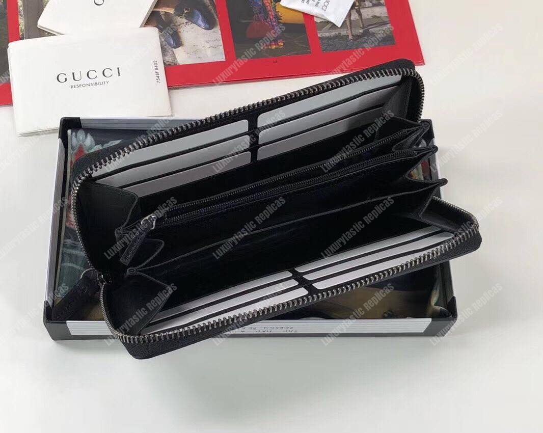 G*u*i gg zipped wallet with tiger print