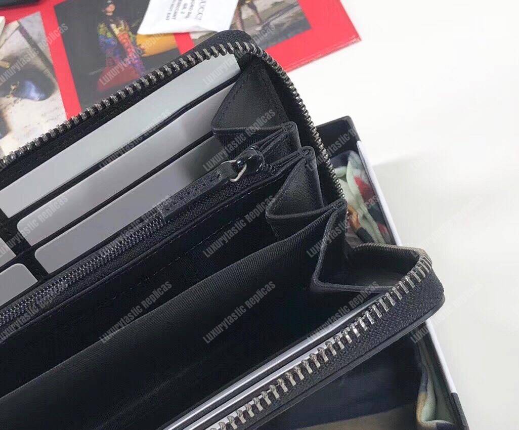 G*u*i gg zipped wallet with tiger print