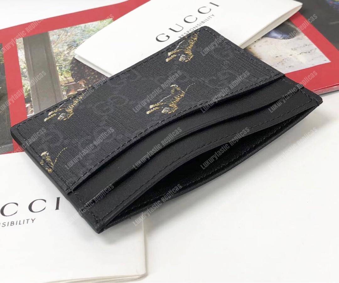 G*u*i gg card case with tiger print